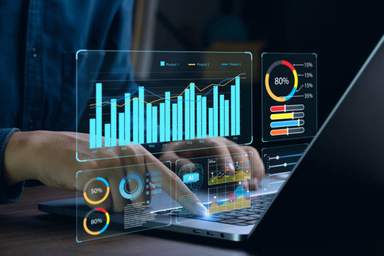 Analyzing financial data on a laptop for debt recovery and cash flow management