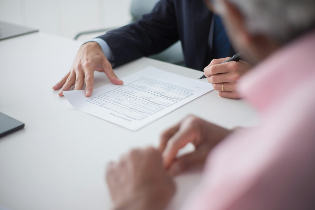 Business professionals reviewing financial documents
