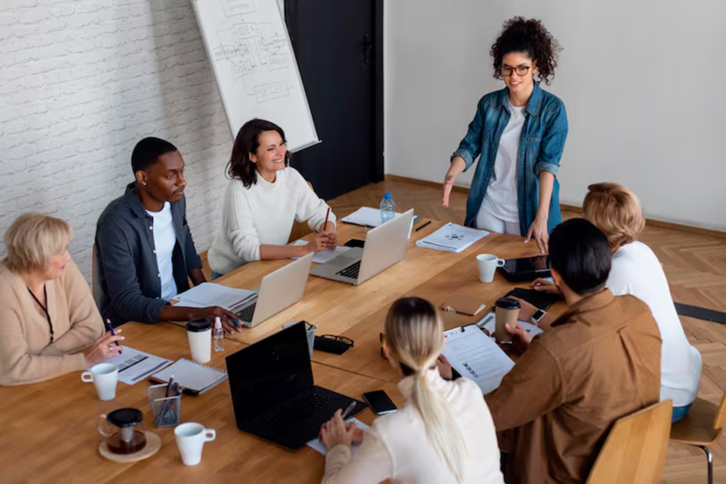Brainstorming session between people seated at a table