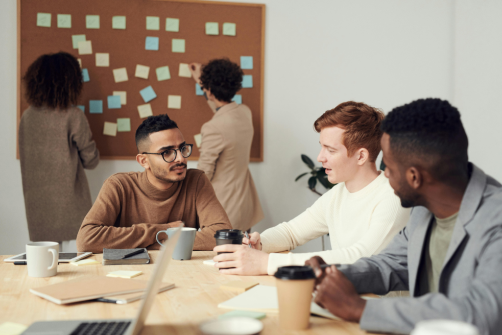 A group of people working together in a modern office