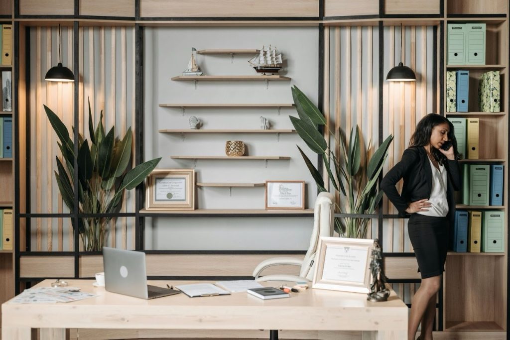 Business owner reaching out to client via phone call.