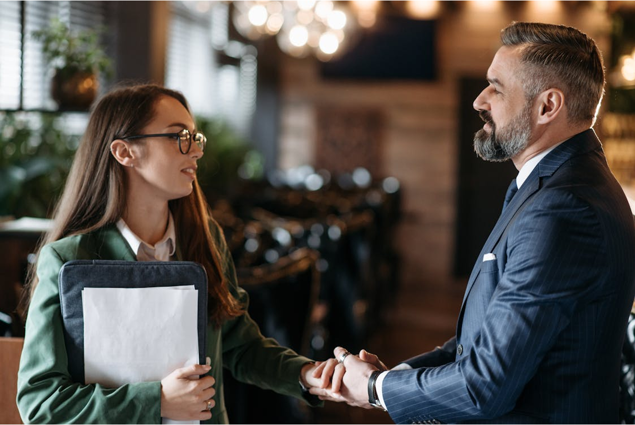 Business professionals shaking hands