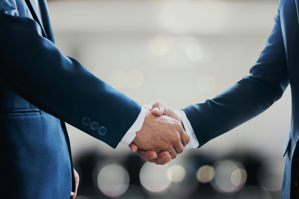Two businesspeople shaking hands