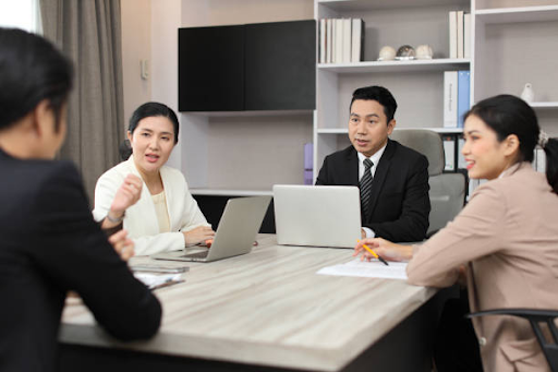 Corporate team conducting a collaborative business meeting in a modern conference room.