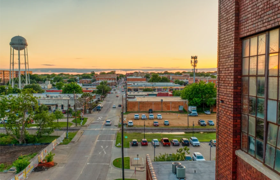 McKinney, TX, business district representing local debt collection services.